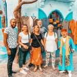 Small group standing together in the streets of Chefchaouen Morocco