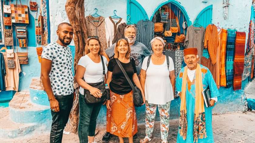 Small group standing together in the streets of Chefchaouen Morocco