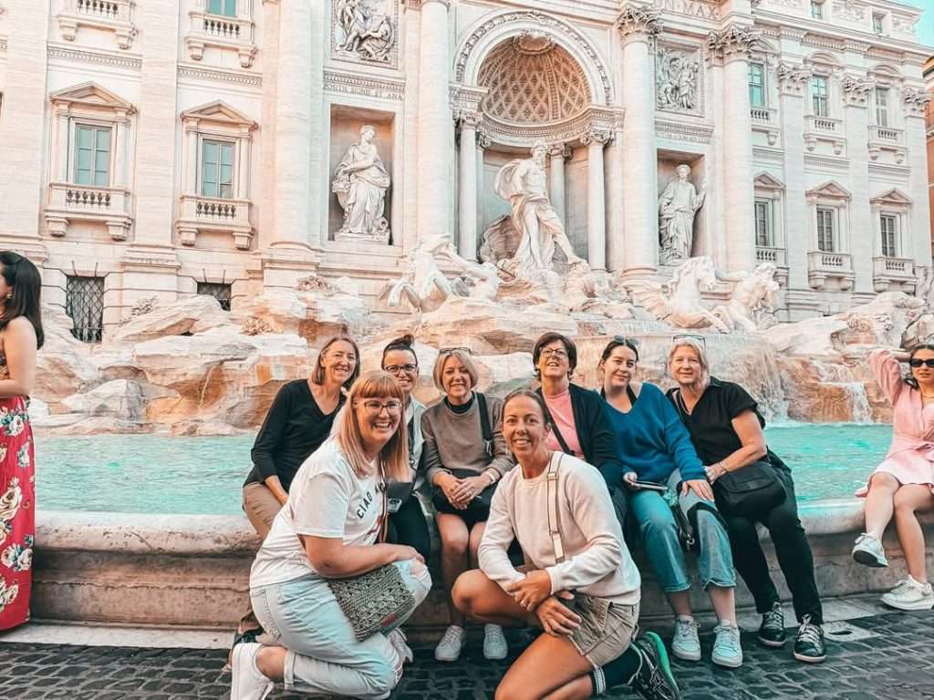 Seeds of Travel group in front of the Trevi Fountain Rome