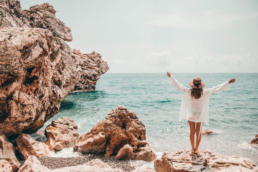lady at the beach seeds of travel