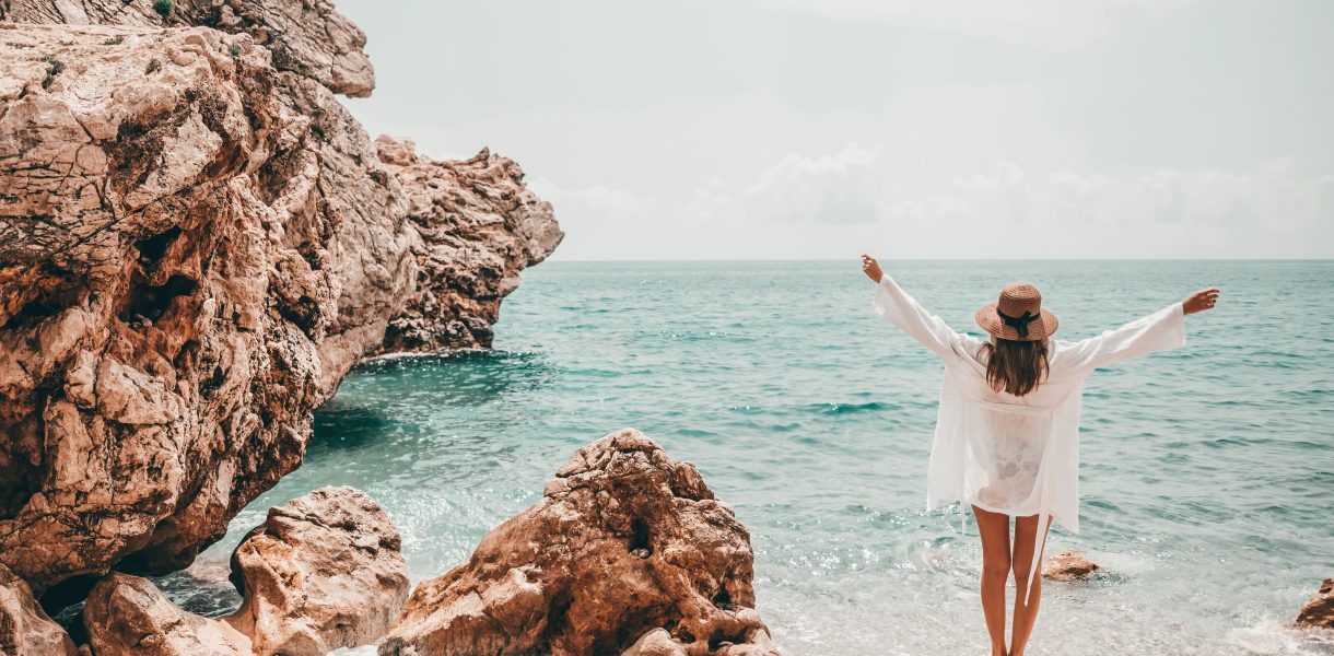 lady at the beach seeds of travel