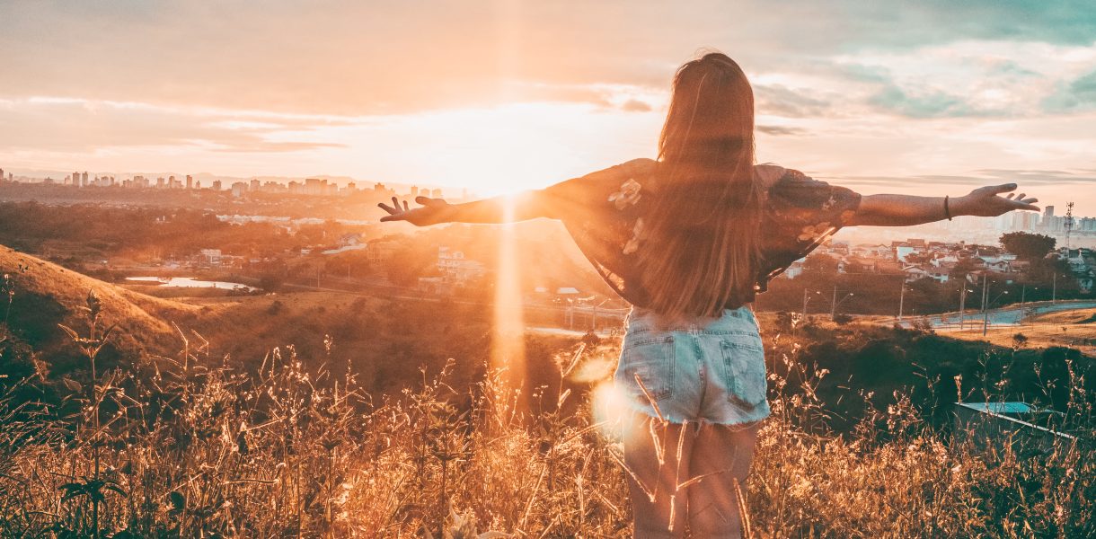 Woman outstretched arms seeds of travel